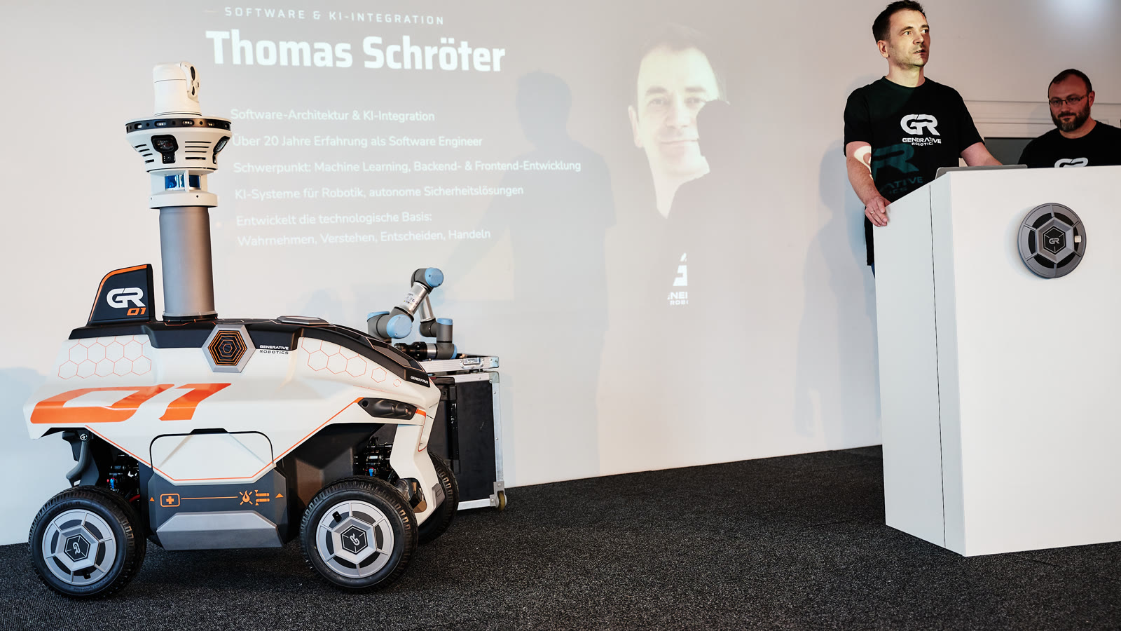 GR-01 with robot arm on stage at the press conference at security essen 2026